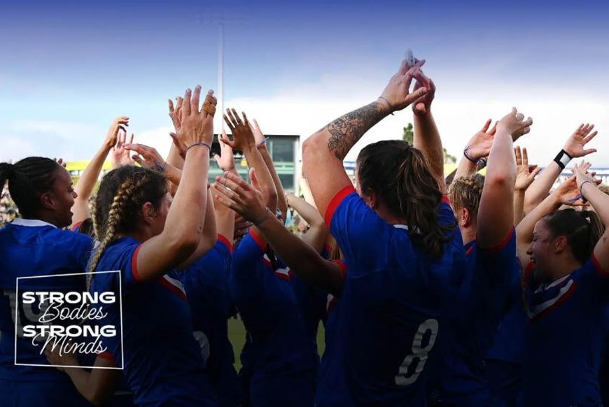 lots of female rugby players dancing
